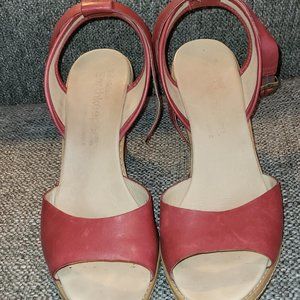 Sandals buckle around the angle.